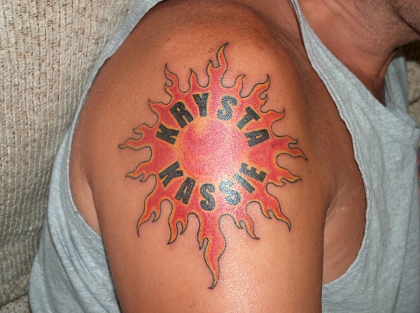 Sun with names tattoo