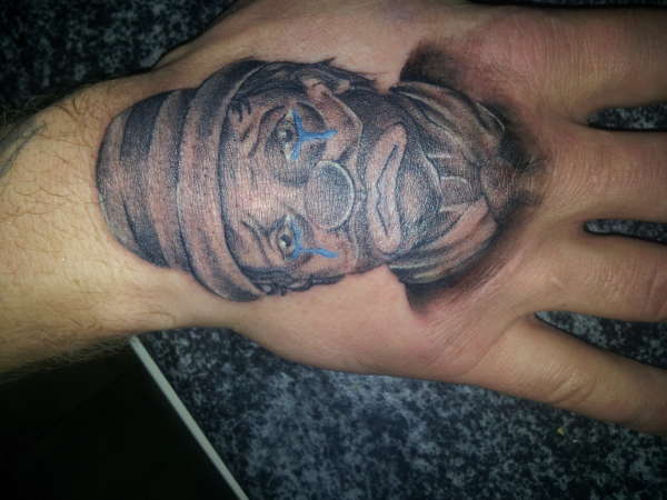 sad clown tattoo
