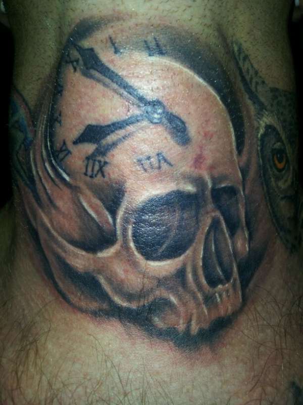 skull clock tattoo