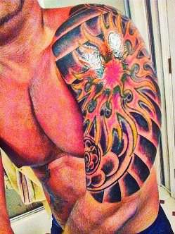 tribal sun tattoo