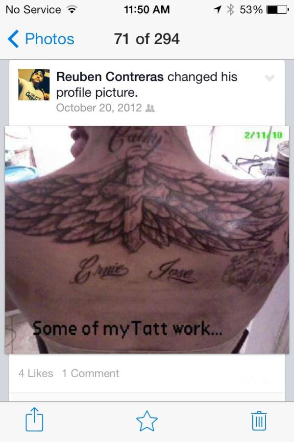 Cross and Wings tattoo