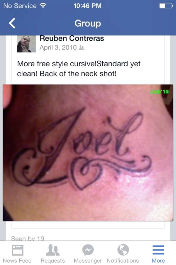 Freehand cursive tattoo