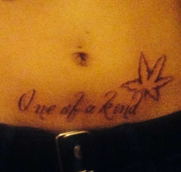 Freehand script tattoo