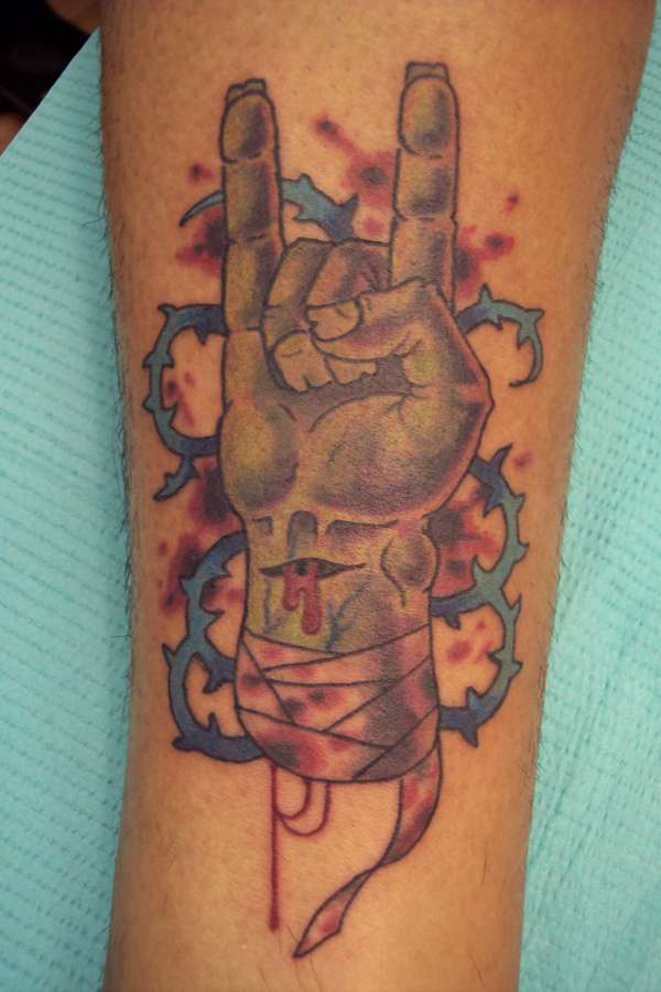 Metal fist tattoo