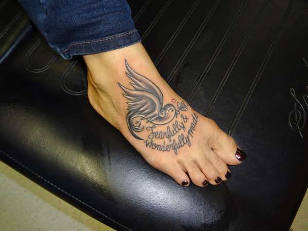 pretty girly sparrow, swallo, dove tattoo by tattoo artist kevin tattoo