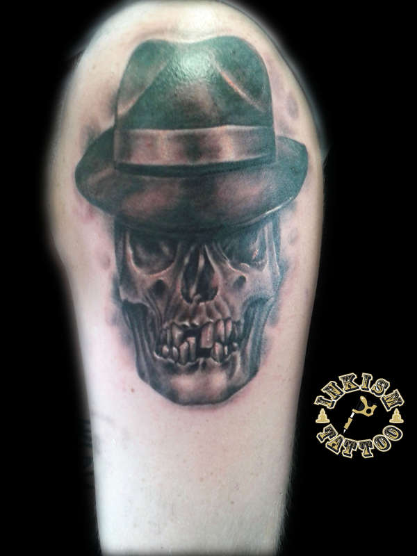 skull with gangster hat tattoo