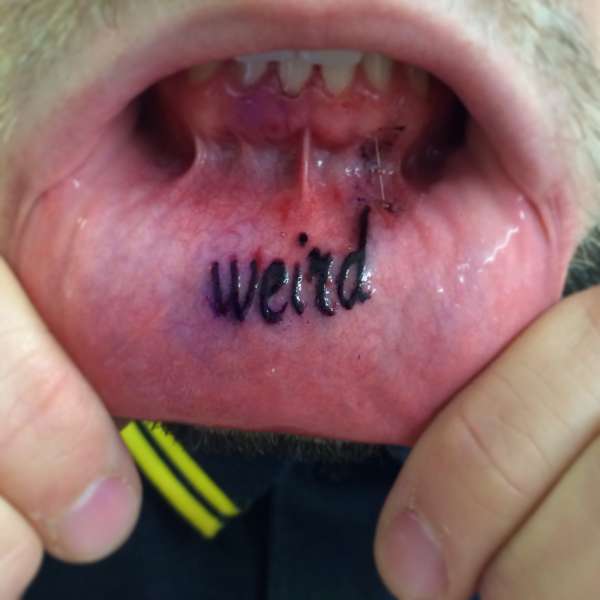 "weird" lip tattoo tattoo