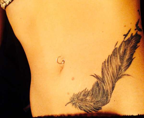 Another view of my feather tattoo tattoo