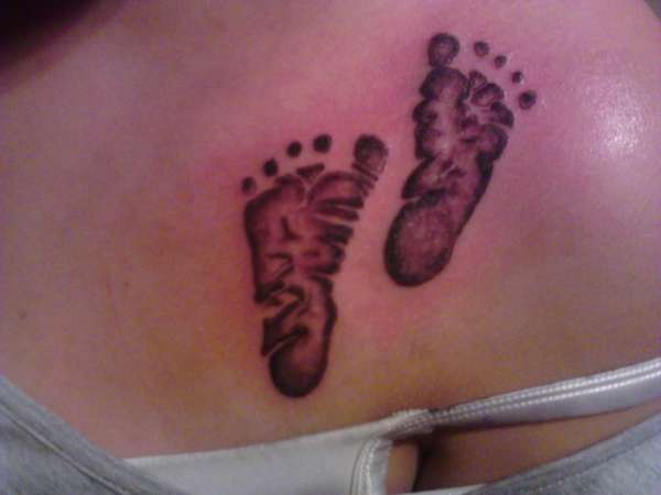Baby footprints tattoo