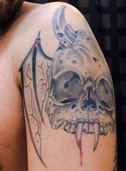 Devil/angel skull tattoo