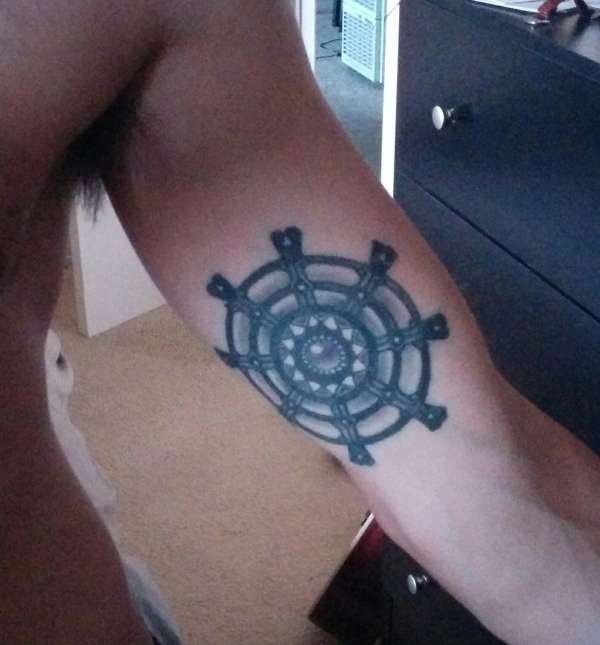 Dharma wheel tattoo