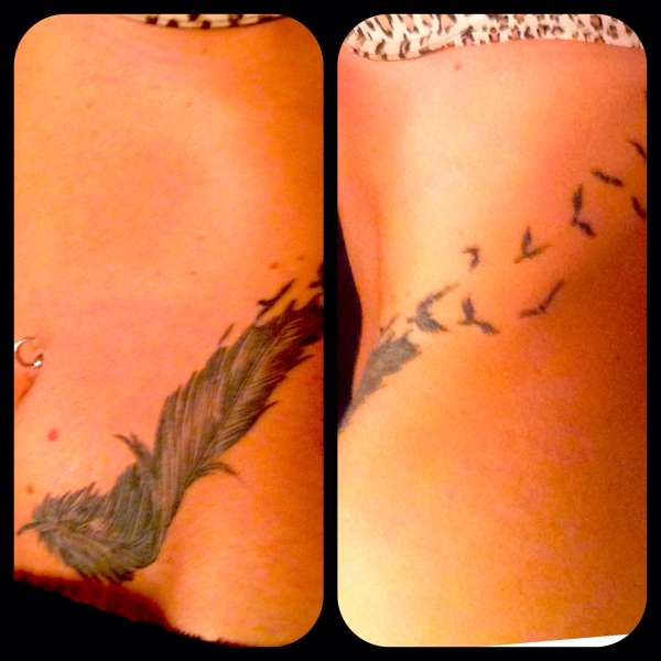 Feather cover up tattoo