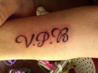 Initials tattoo