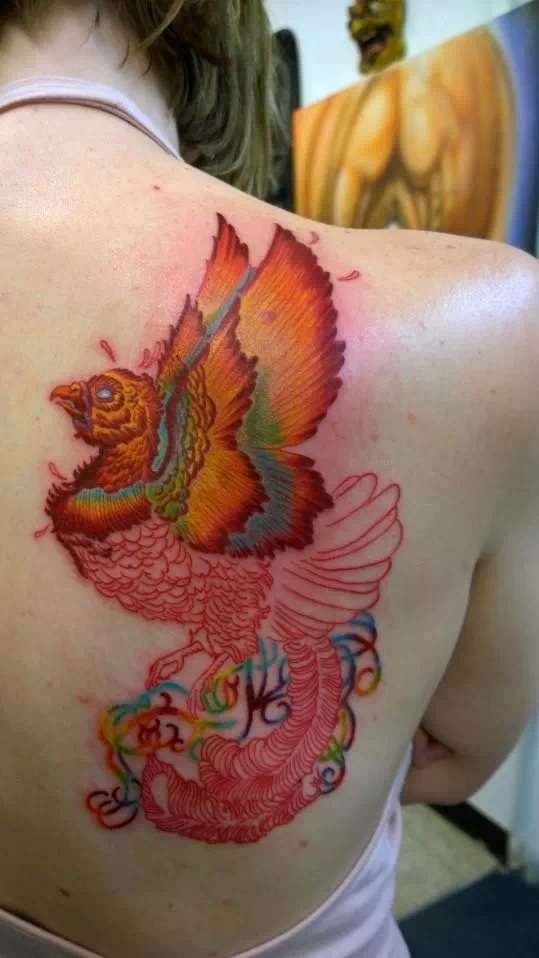 Phoenix half done tattoo