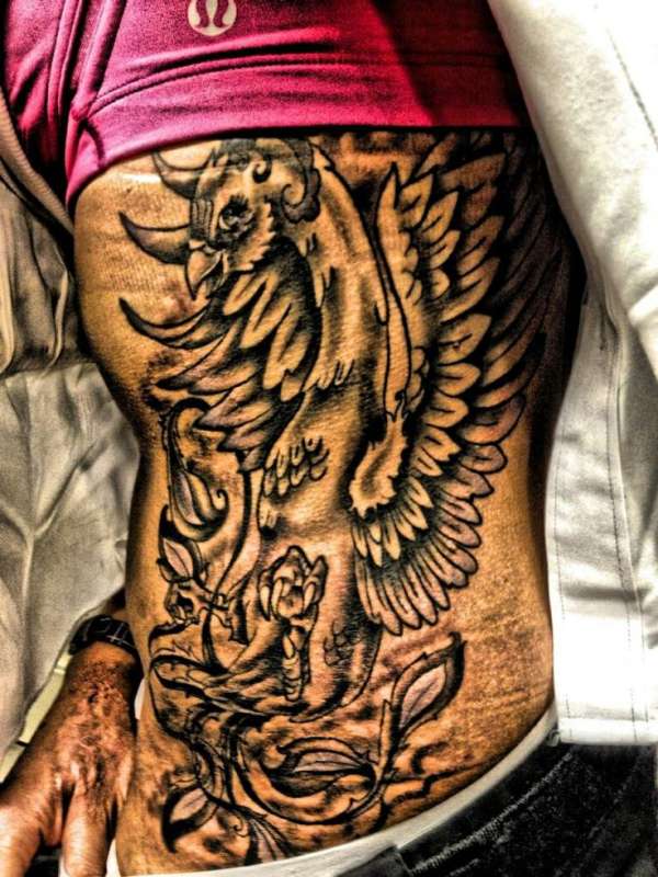 Phoenix rib tattoo tattoo
