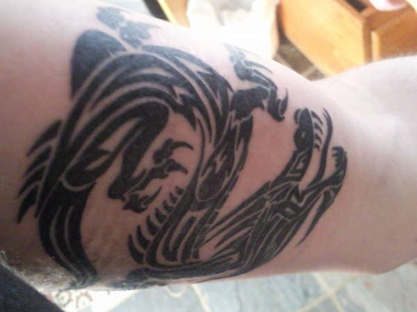 left arm dragon tattoo