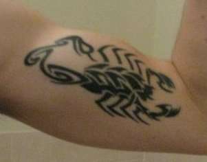 right arm scorpion tattoo