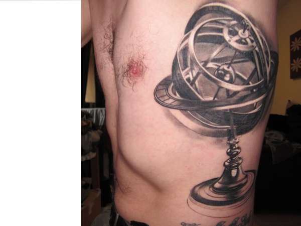 Armillary sphere after first session tattoo