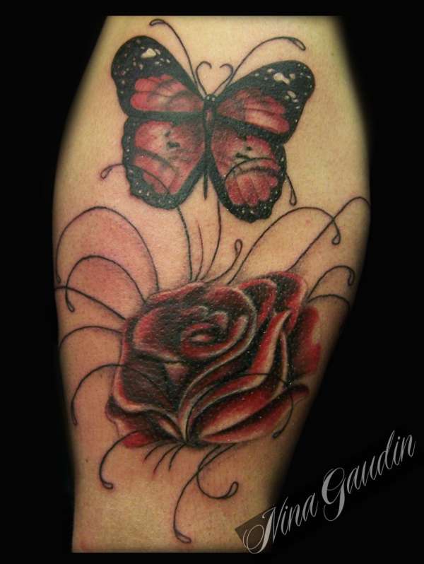 Black and Red Rose and butterfly tattoo