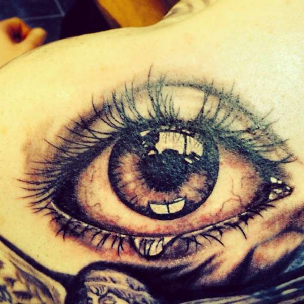 Eye piece tattoo