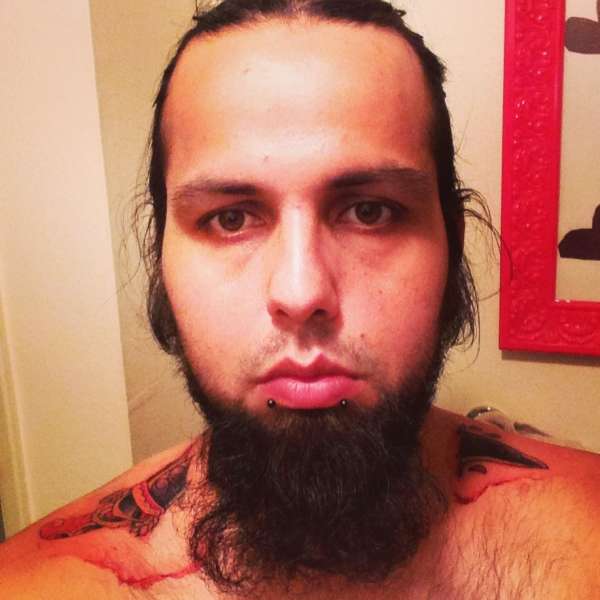 Knife through the neck tattoo