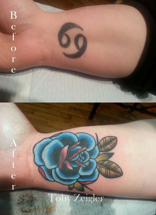 Rose cover-up tattoo