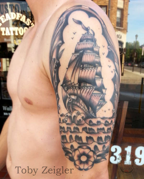Sailboat half sleeve tattoo
