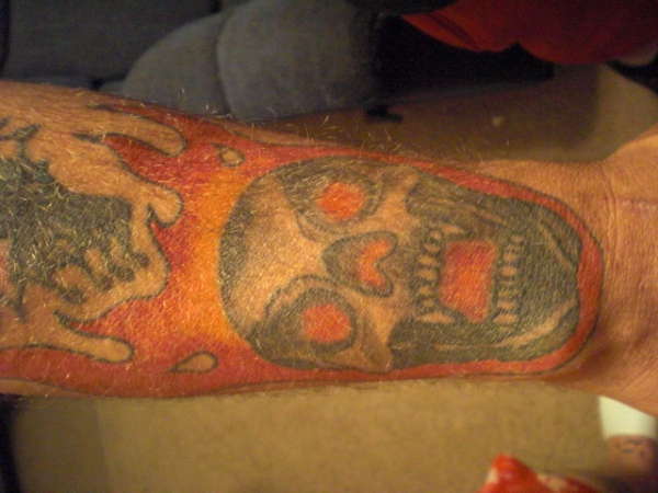Skull on Brothers Arm tattoo