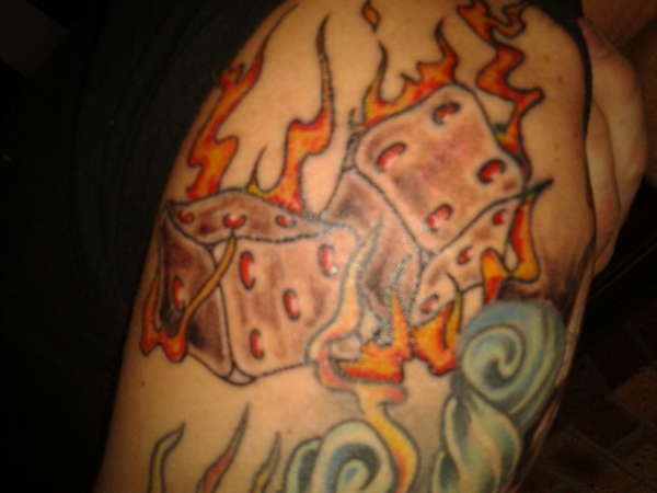flaming dice tattoo