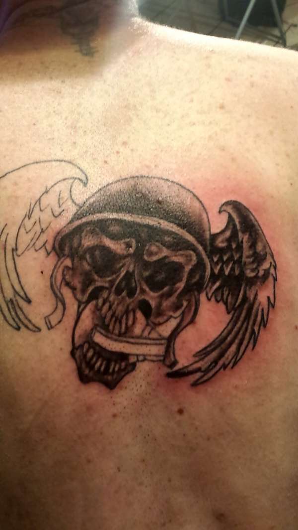 flying skull tattoo