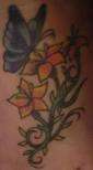 flowers and butterfly tattoo