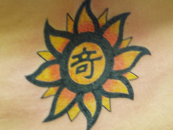 Unique Sun Burst tattoo