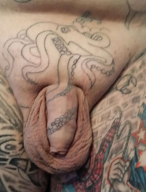 octopus outline on penis tattoo.
