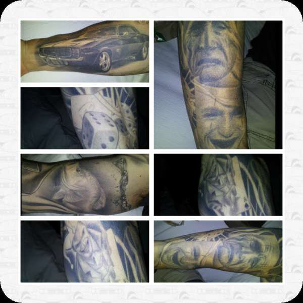 black and grey arm sleeve tattoo