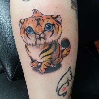 Cute tiger tattoo