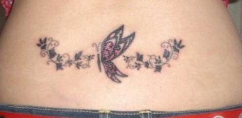 Lower back butterfly tattoo