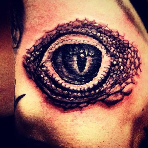 Reptile eye tattoo