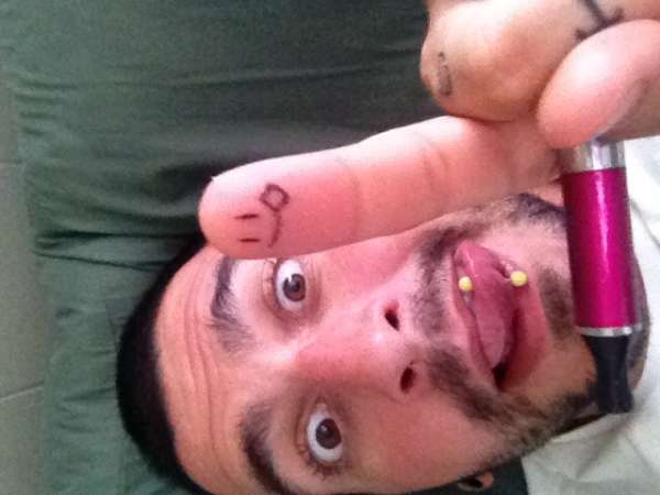 Smiley tattoo