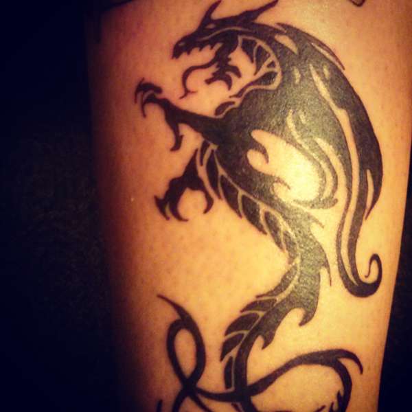 Tribal dragon tattoo