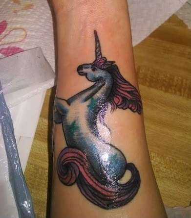 Unicorn on inner wrist tattoo