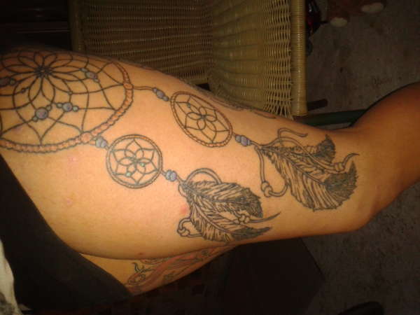 dream catcher with baby cow tattoo