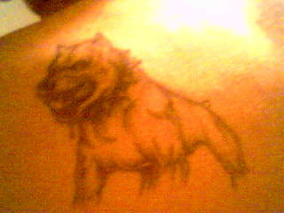 bf's left shoulder blade tattoo