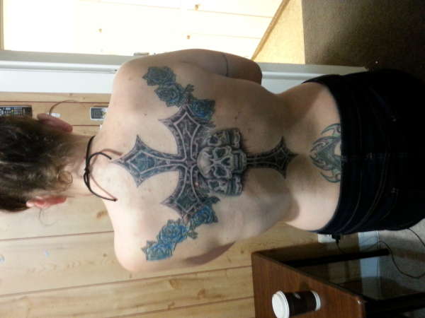 skull blue rose cross cover up tattoo