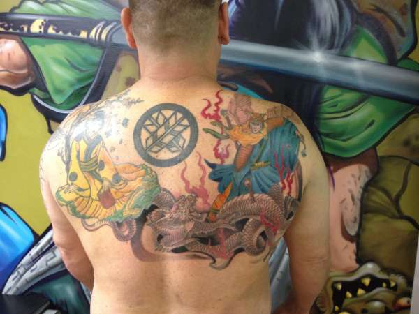 Oriental St. Michael slaying dragon tattoo