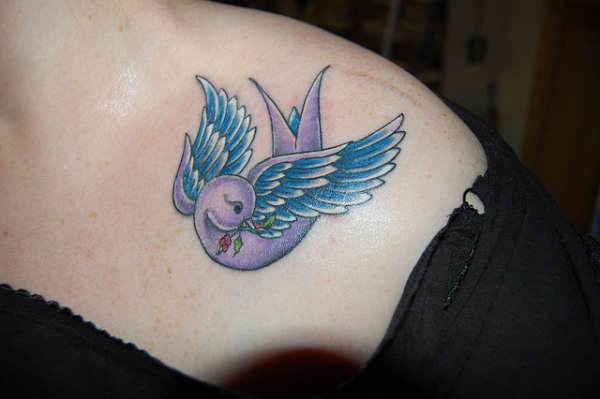Swallow for my daughter tattoo