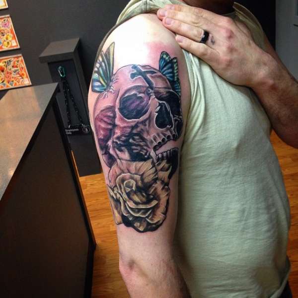 full color skull and rose tattoo sleeve for a man tattoo