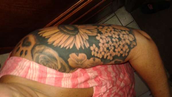Flower half sleeve tattoo