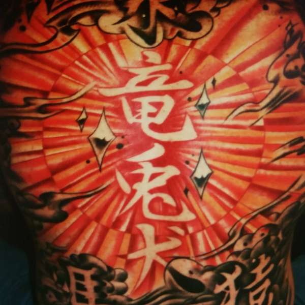 Kanji sun full back tattoo by Steve'O tattoo