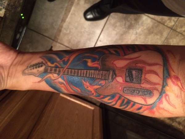 My Favorite Guitar with Phoenix tattoo