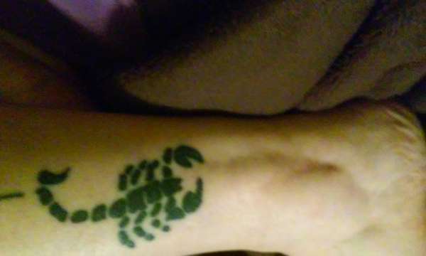 Small Tribal Scorpion tattoo